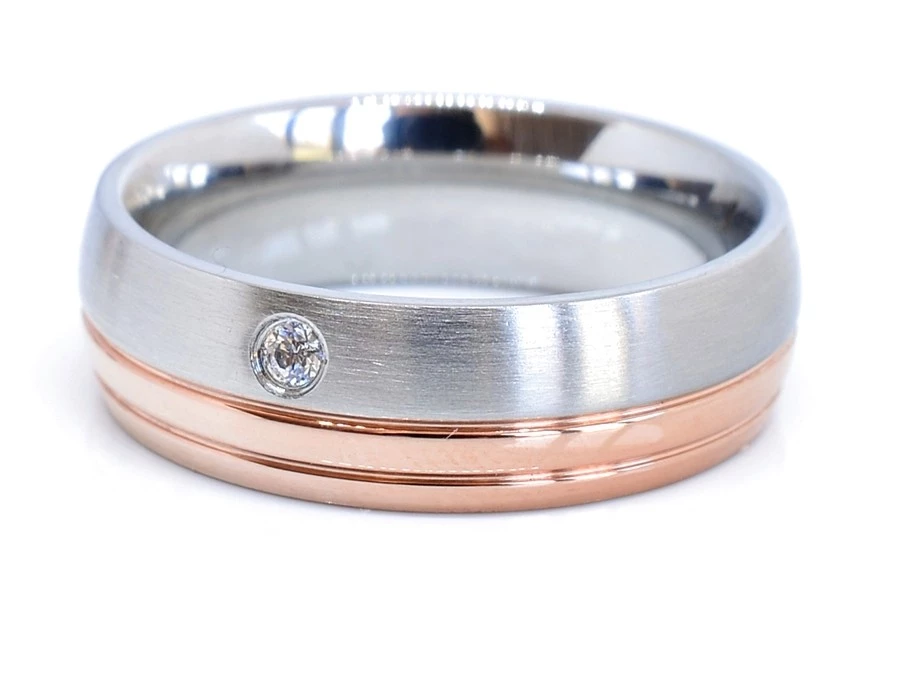 Ocelový snubní prsten zlacený s kamínkem 55
